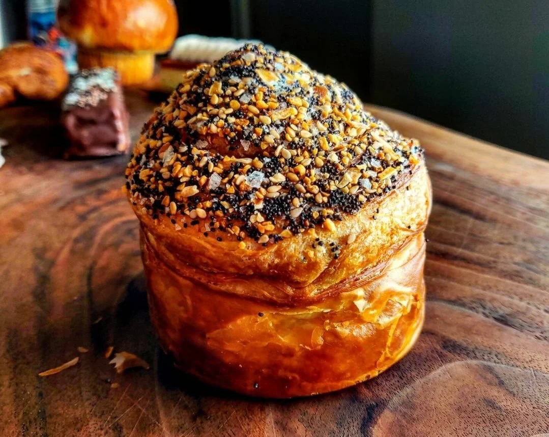 Scallion cream cheese breakfast croissant muffin with everything bagel seasoning in myrtle beach, south carolina