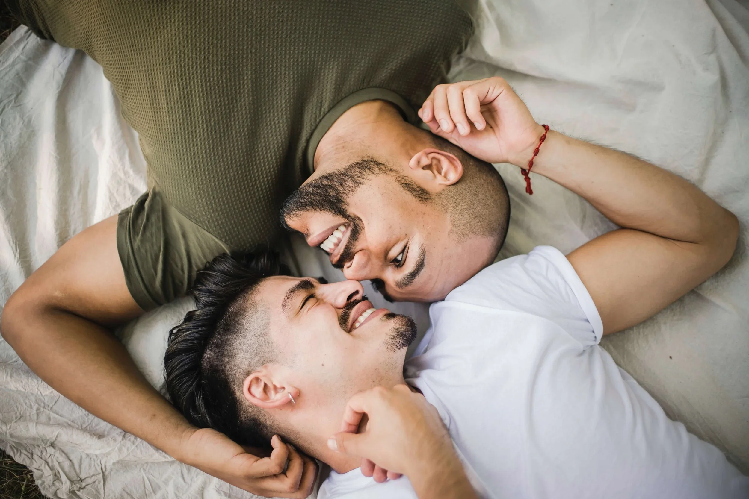 Gay couple reconnecting after conflict.