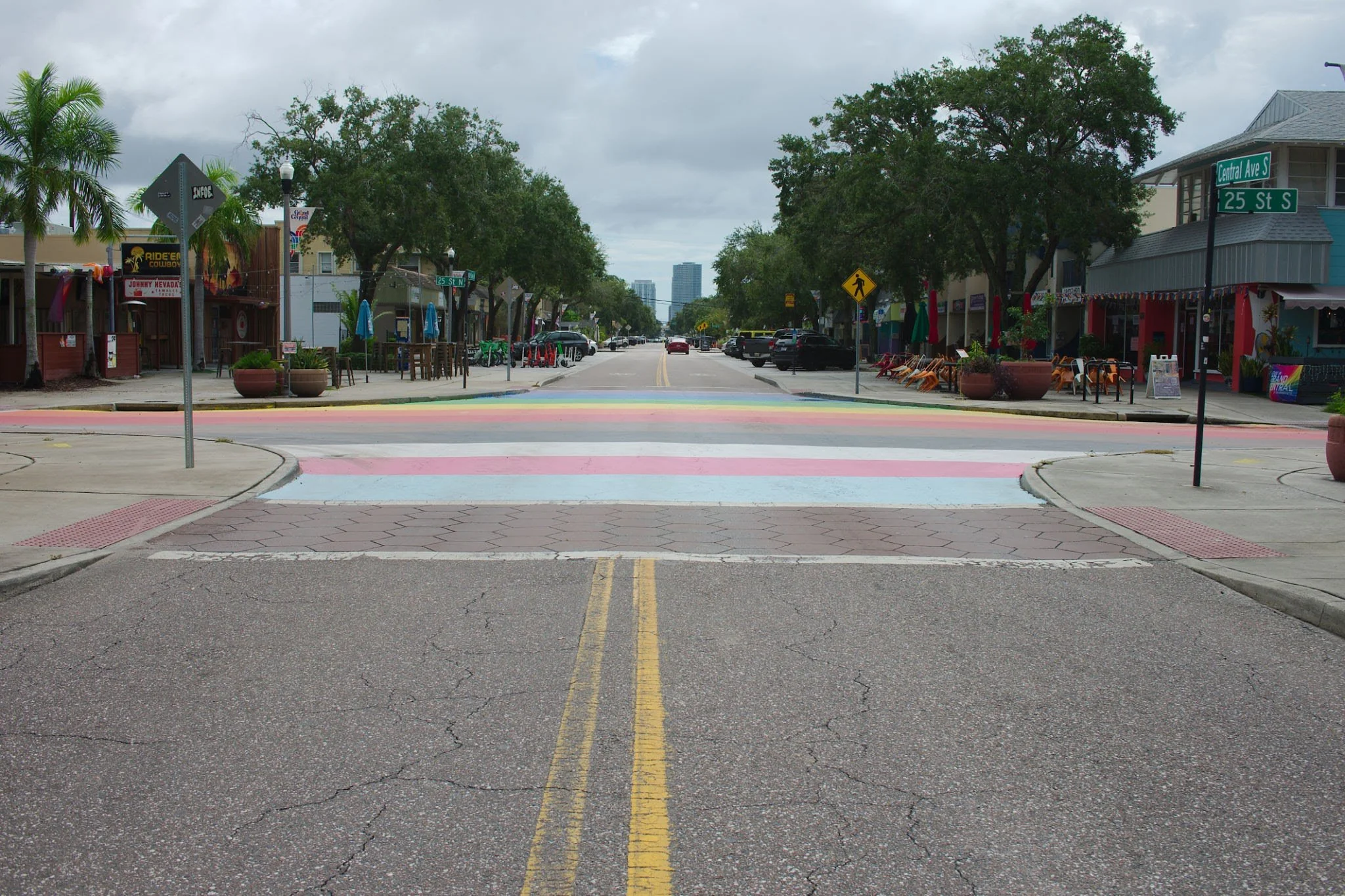 Colorful rainbow crosswalk street in the vibrant Grand Central District of St. Petersburg, Florida