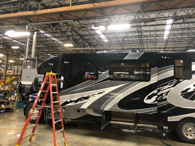 Fleet bus maintenance and exterior refurbishment at MB Industries