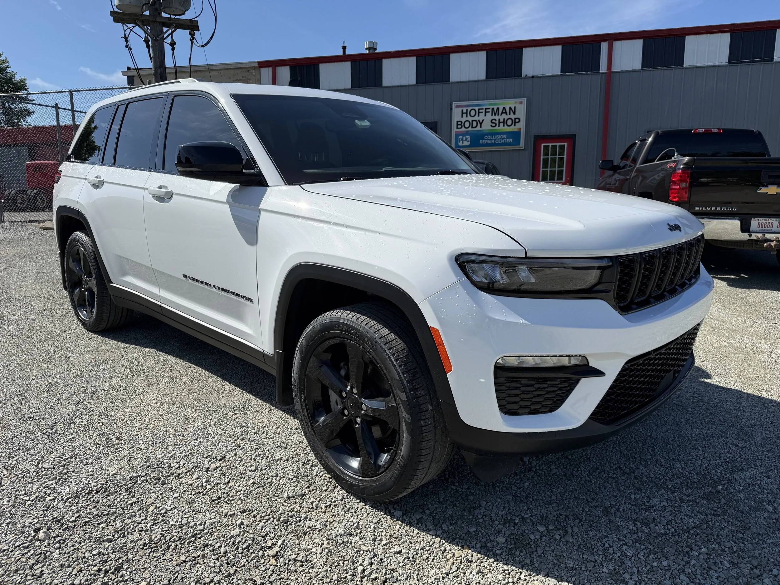 Professional collision repair on a damaged vehicle with precise bodywork and factory-matching paint refinishing.