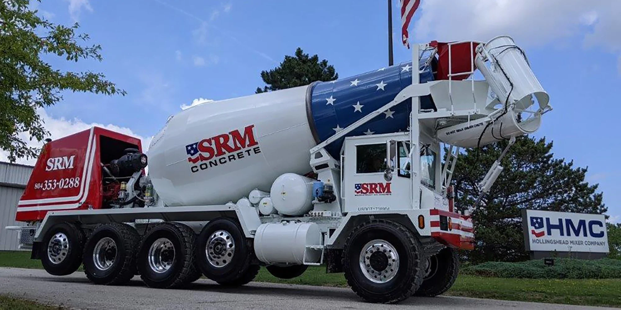 Freshly painted concrete mixer truck with multi-stage industrial coatings delivering vibrant color and job-site ready durability.