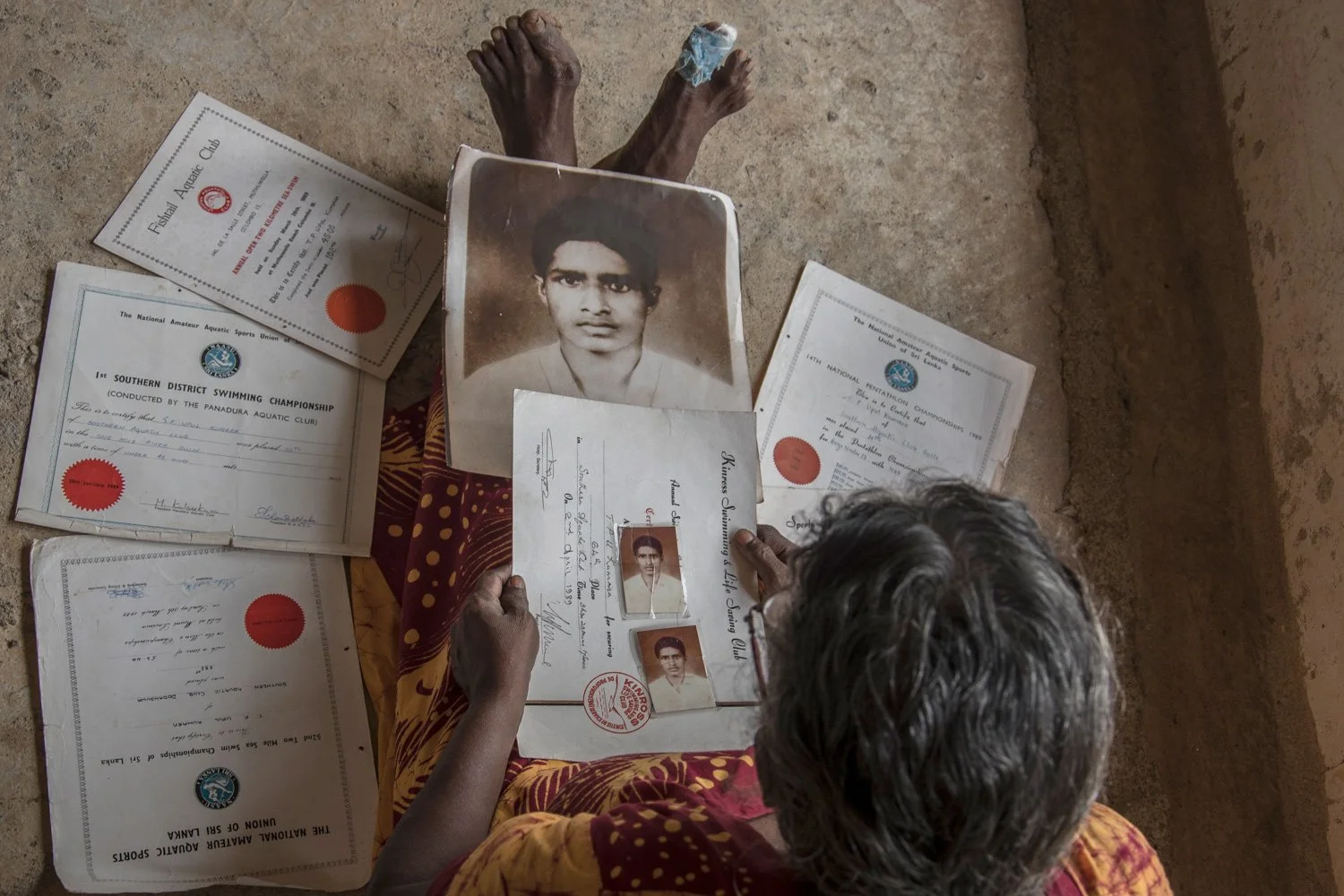 A mother carefully preserves her son's certificates decades after his disappearance. They testify to his hopes, achievements, and future plans before he vanished in 1989. Today, they serve as evidence of both a life lived and a loss unresolved.