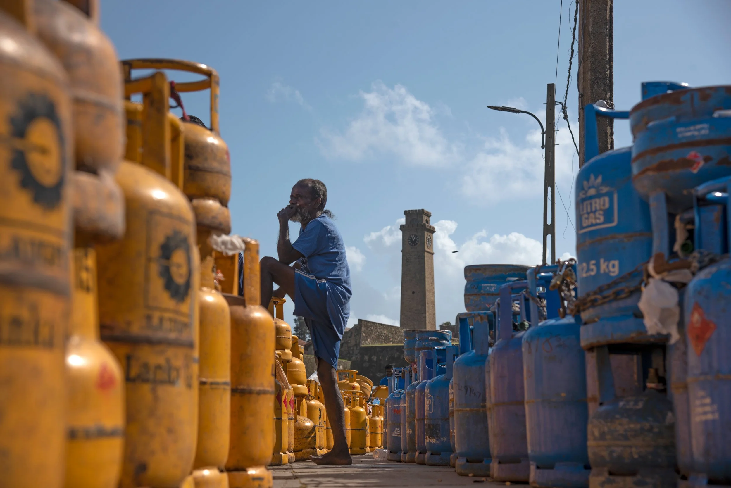 Gas cylinders lined up near the Galle International Cricket Stadium. As you enter the town of Galle, a queue of people and gas cylinders near the historic Galle Fort captures your attention a powerful reminder of the fuel and cooking gas shortages du