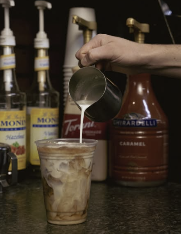 Handcrafted drink with whipped cream from Kaffee Klatsch.