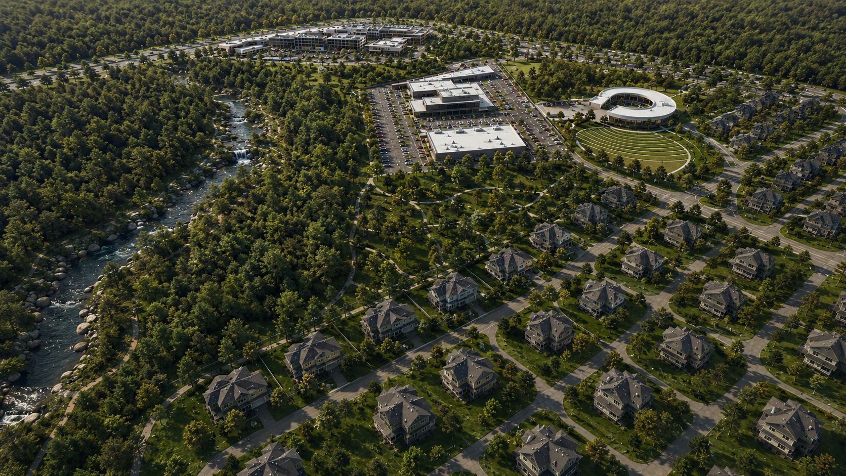 Aerial view of a suburban area with a large shopping center, residential houses, a river, and green parks and trees.