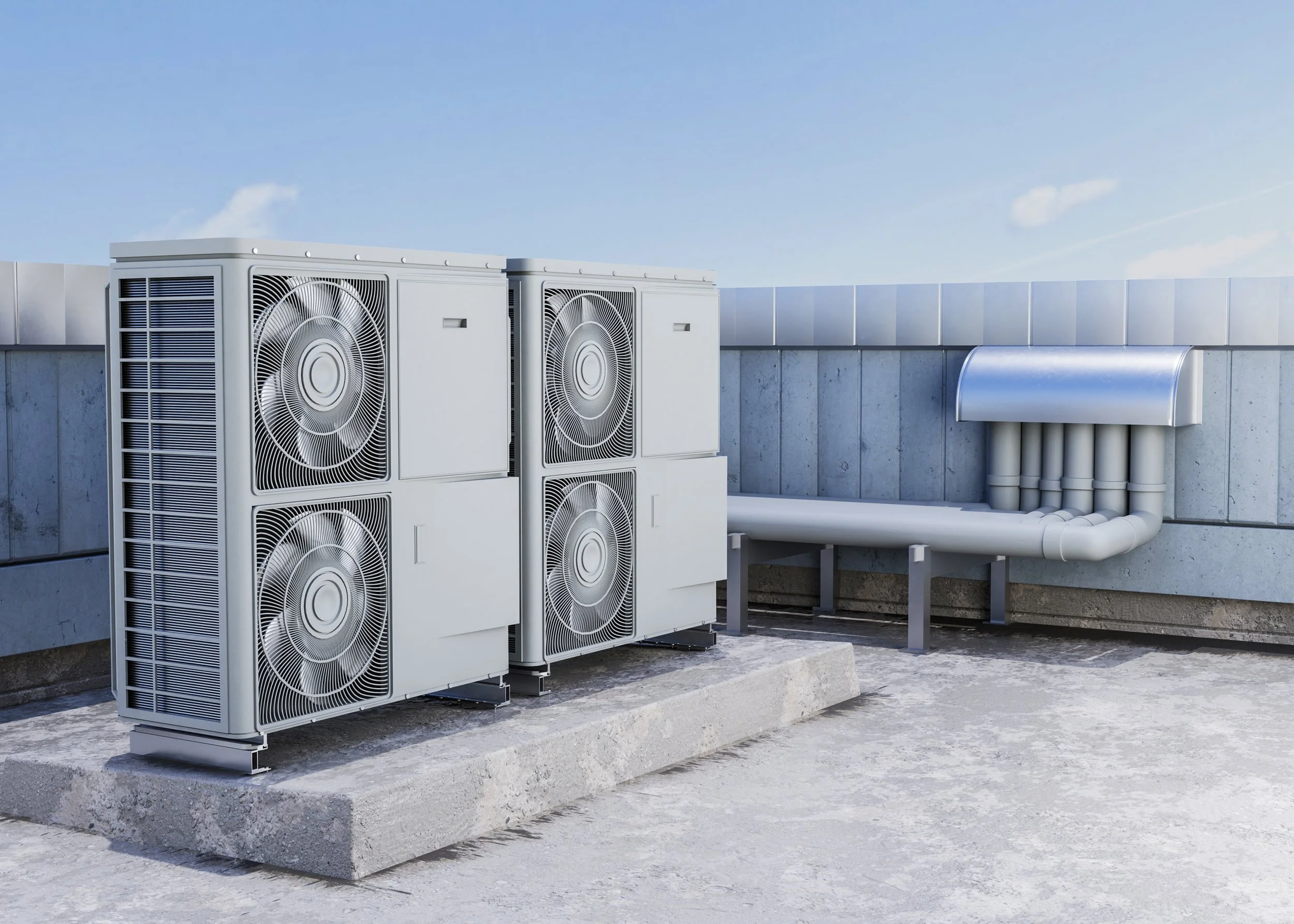 HVAC units on a rooftop against a blue sky