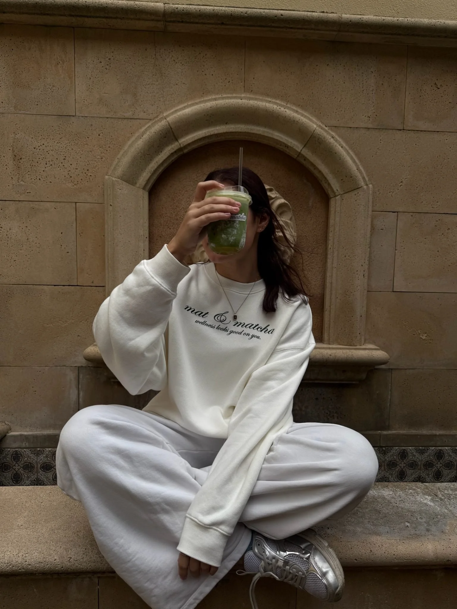 mat-matcha-sweatshirt-iced-cup-stone-steps.jpg
