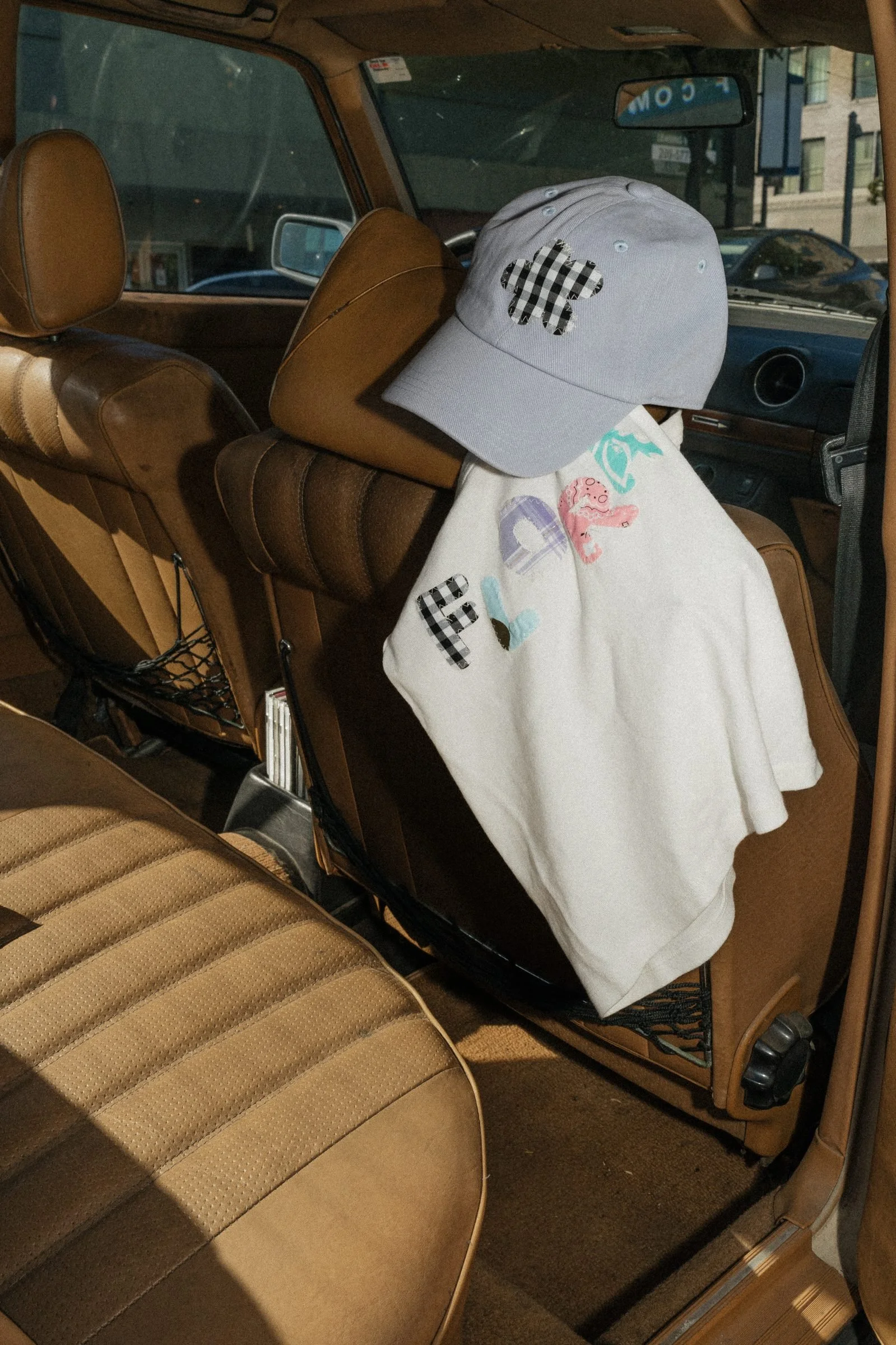 flora-cafe-gingham-hat-graphic-tee-car.jpg