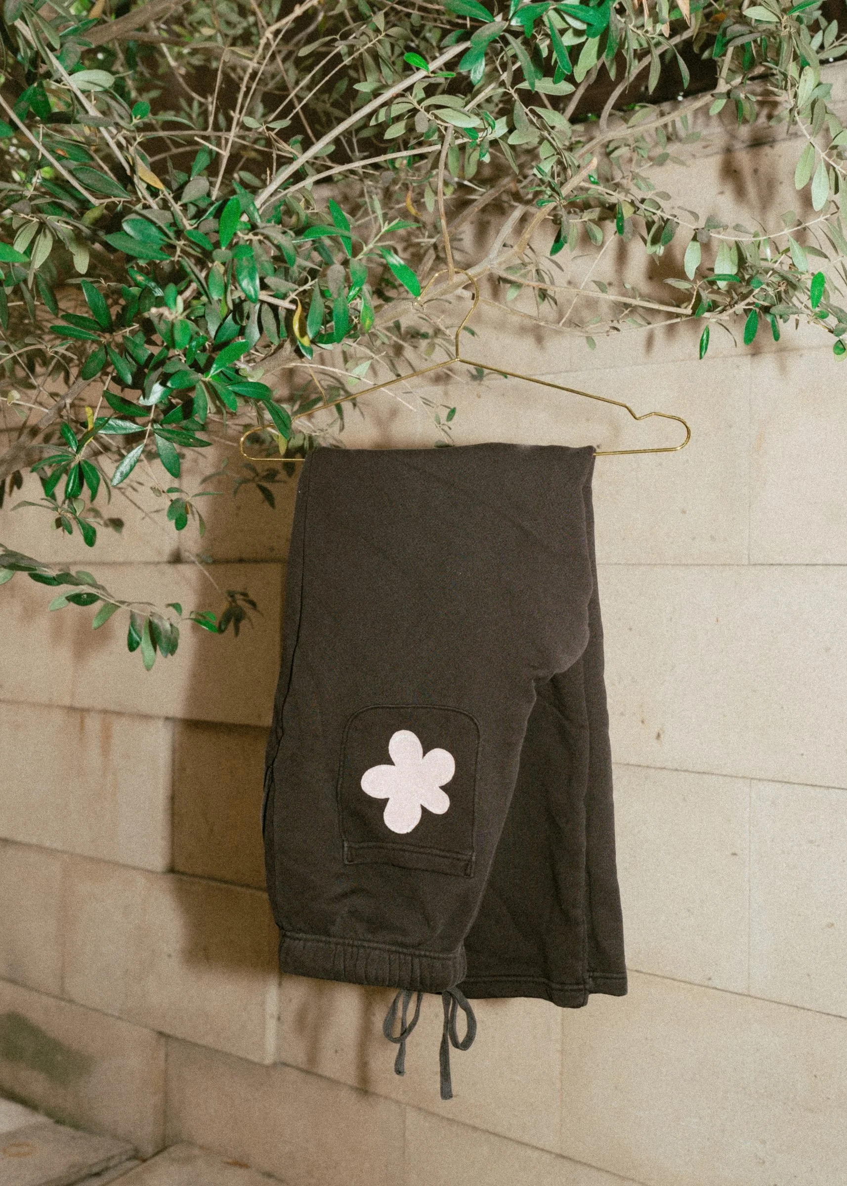 flora-cafe-black-sweatpants-flower-patch.jpg