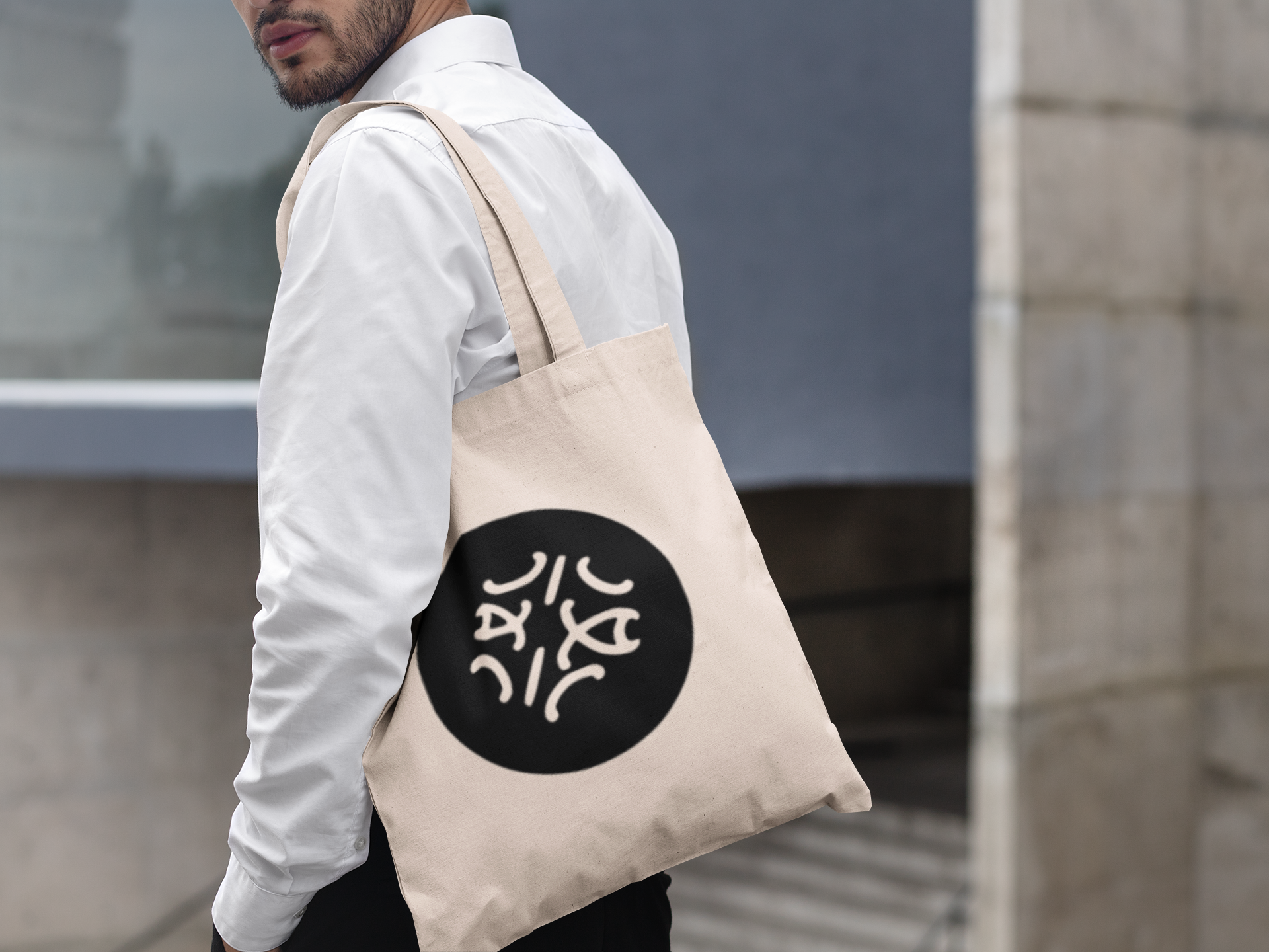 tote-bag-mockup-featuring-a-bearded-man-in-an-urban-scenario-29430.png