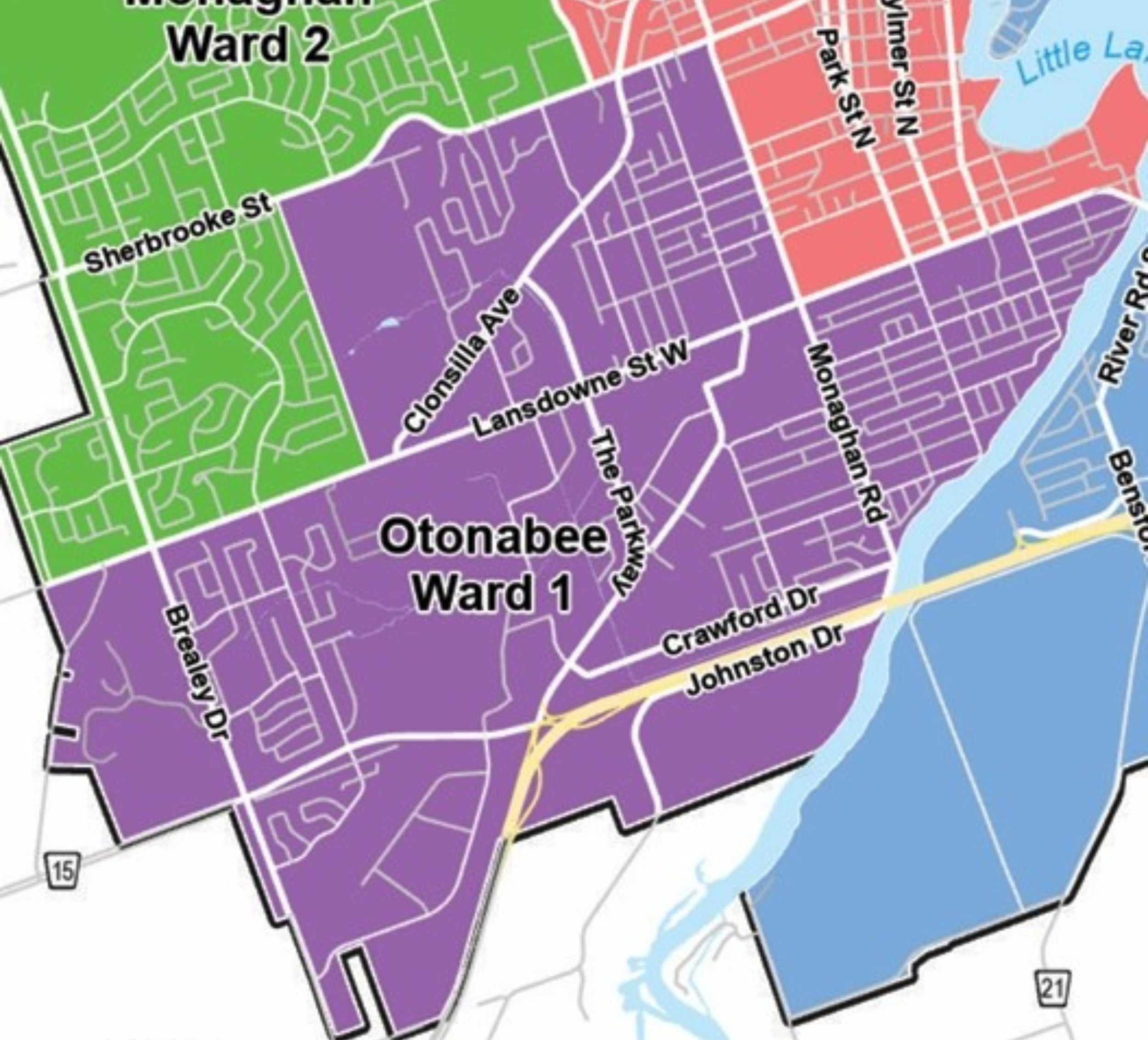A map of a city with neighborhoods highlighted in different colors, including green, purple, and red. Street names and water bodies are also visible.