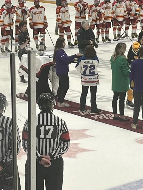Lesley Parnell presenting the Gold medals at Telus Cup May 2026, hosted in Peterborough, ON.