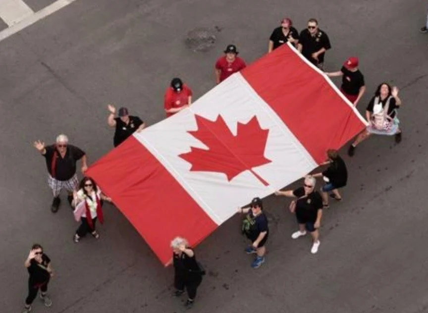 Canada Day parade 2025. We carried the Peace Tower flag and handed out 2000 freezies. Happy birthday Canada. Thanks East Peterborough Lions!