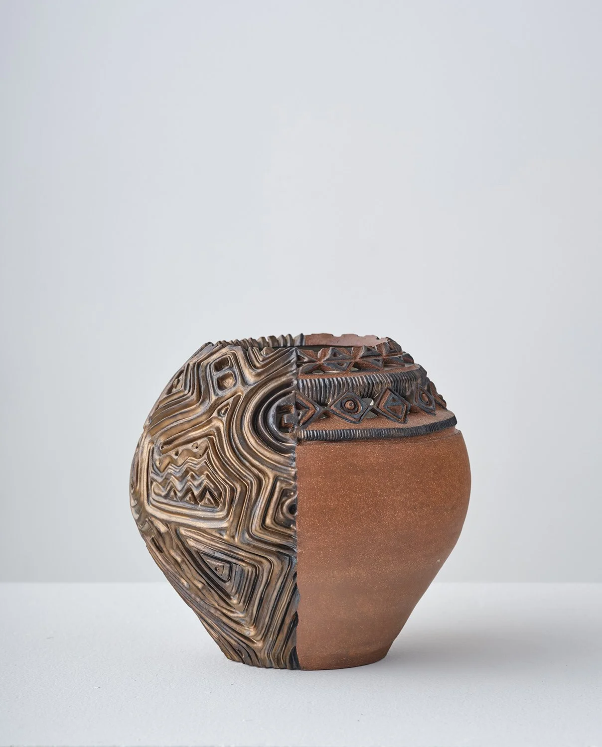 Half/Half II 2026 (side)  
9 x 9 x 9 in Terracotta, glaze 