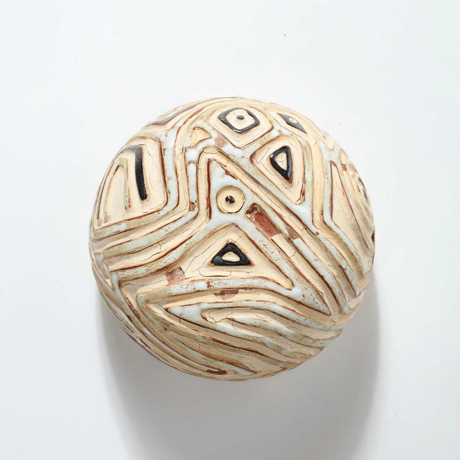 Ayawa, 2023 (bottom)  
5.5” x 8 x 8’ Terracotta, clay slip and glaze

