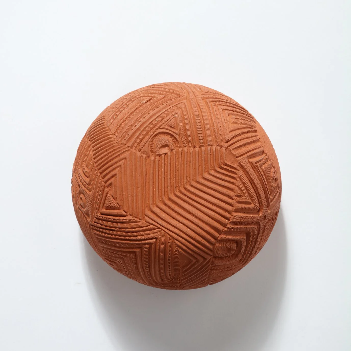 Yabba I, 2023 (bottom)   
5.5” x 8 x 8’ Terracotta, clay slip and glaze
