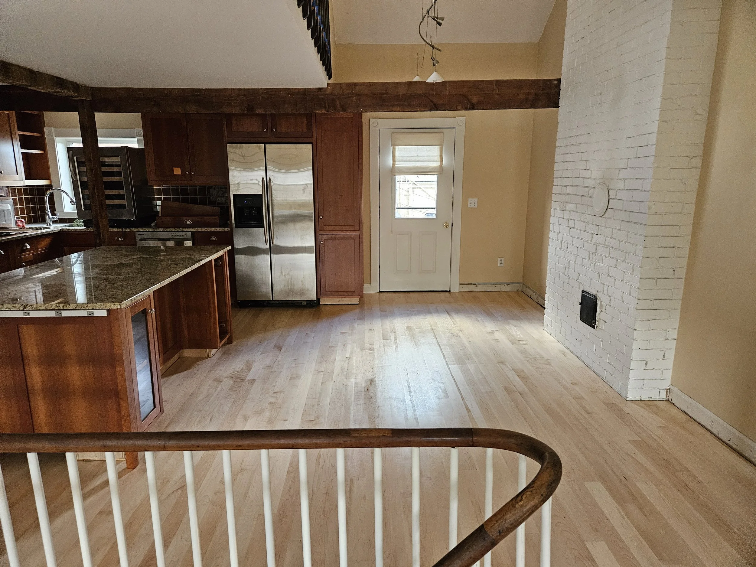 The floor is in, sanded, and has two coats of finish. One more to go. 