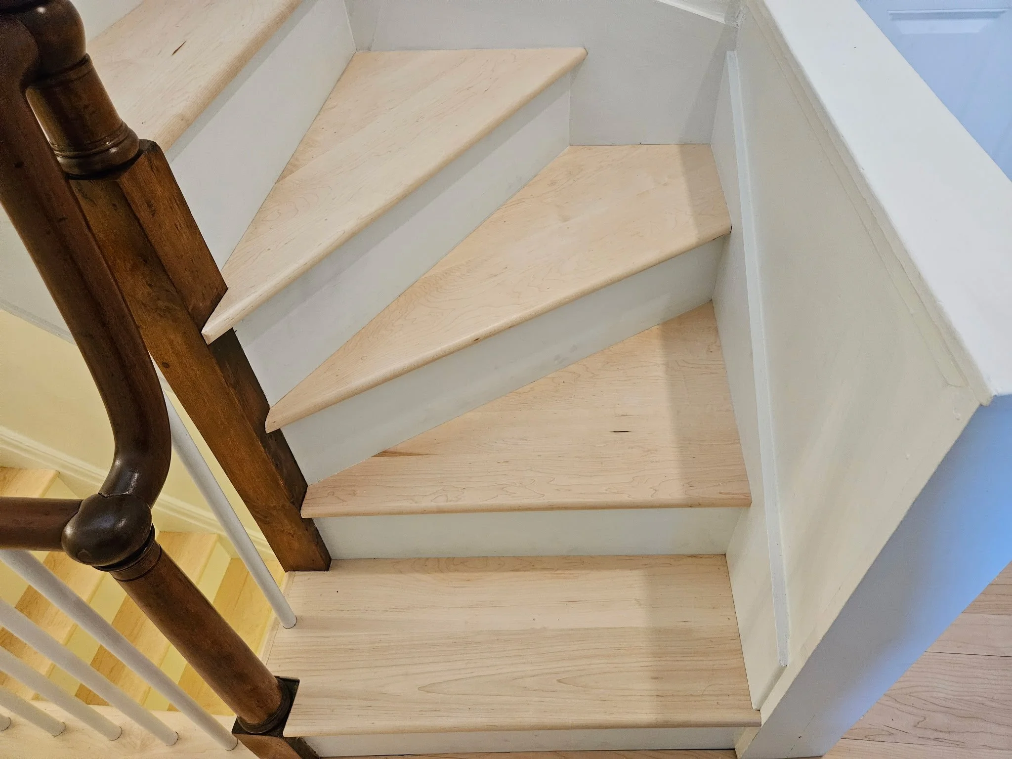 The winders were a big transformation, both in appearance and stability. The original framing was rotting away, so we were able to reinforce and add framing to make these stairs stable and ready to last for generations to come. 