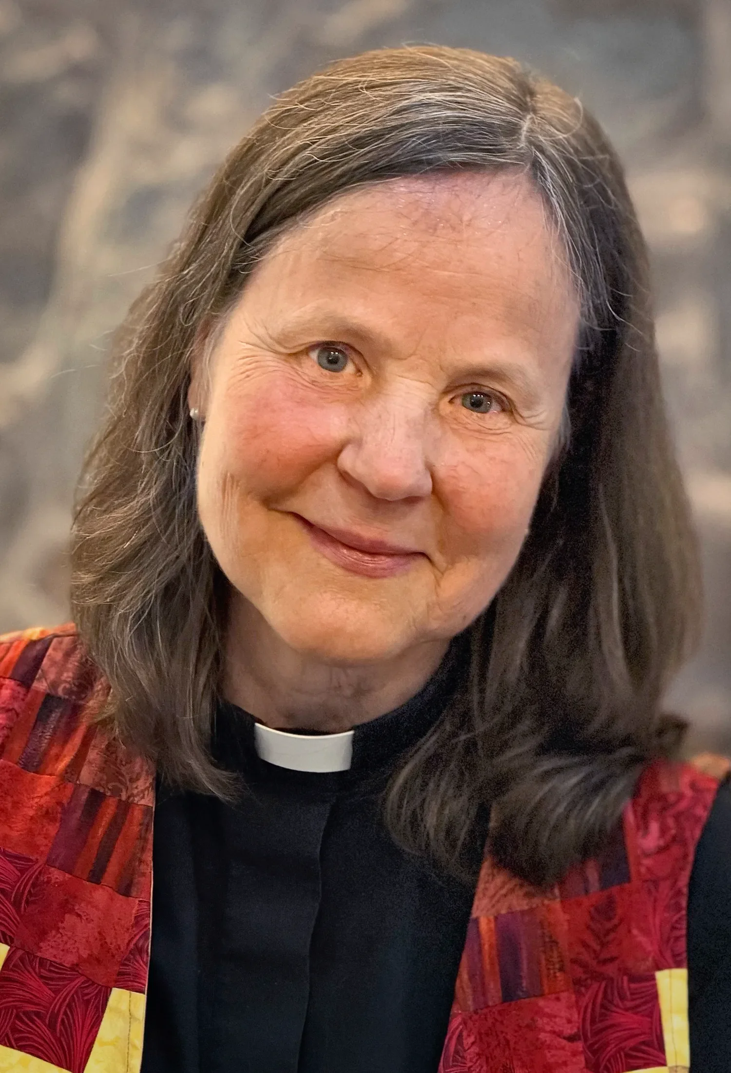 Portrait of Kristin, Reverend and Administrative Coordinator at St. Thomas’ Church Whitemarsh.