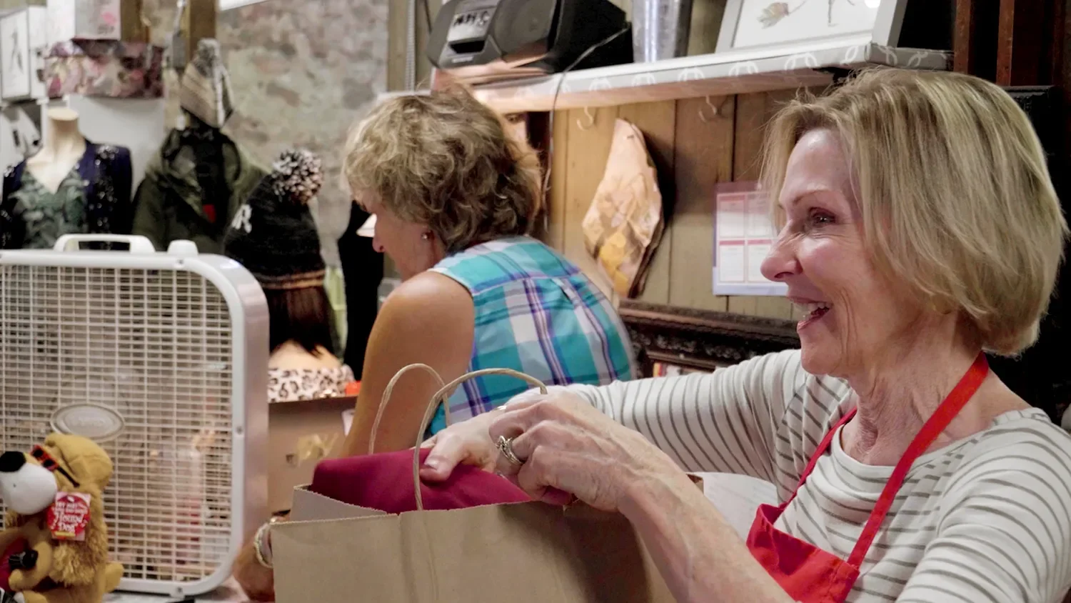 Smiling volunteer at The Barn St. Thomas’ Church Whitemarsh.