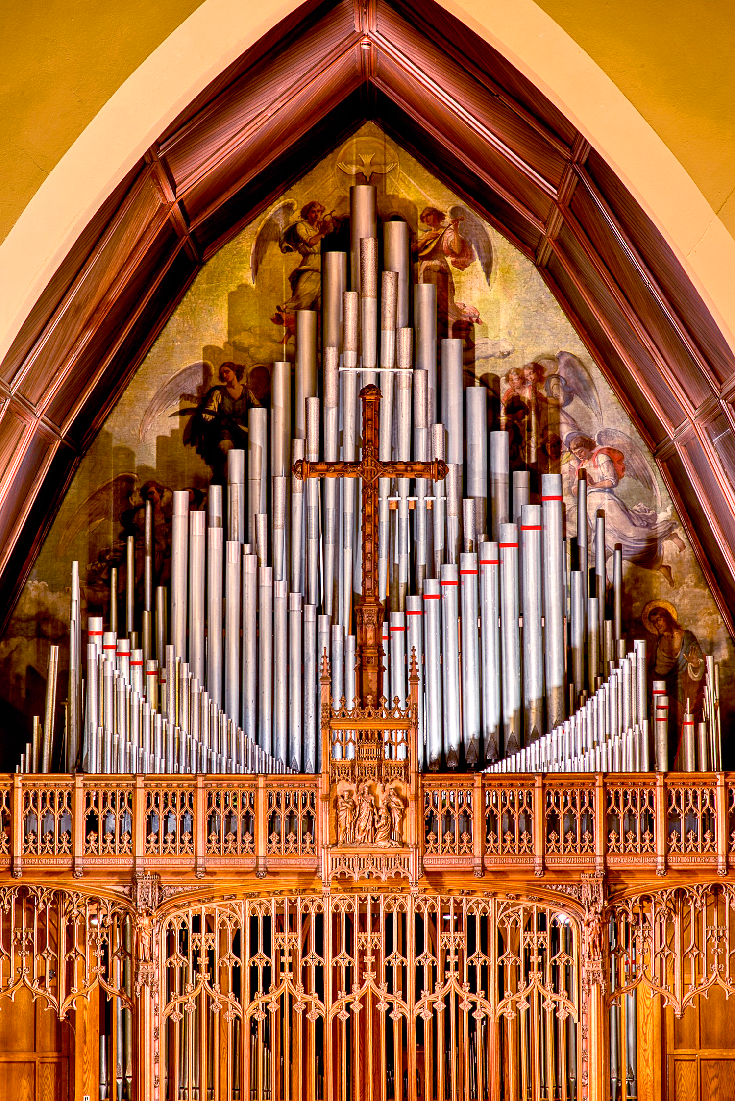 Organ pipes and a wooden cross detail inside the main church at St. Thomas’ Church Whitemarsh.