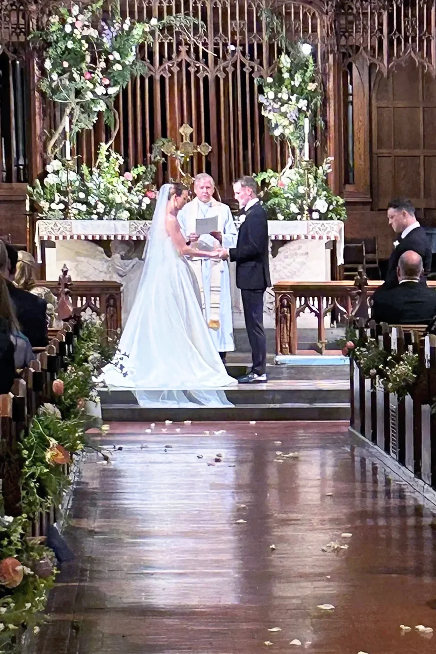 A couple gets married in the main church at St. Thomas’ Church Whitemarsh.