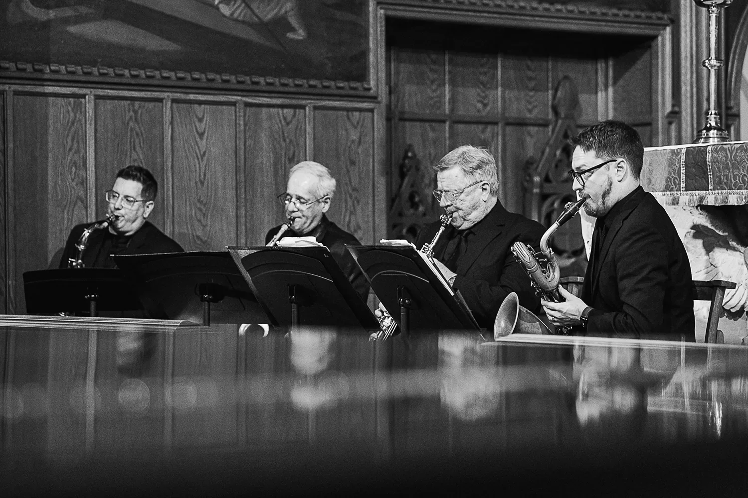 A saxophone quartet plays during a wedding in the main church at St. Thomas’ Church Whitemarsh.