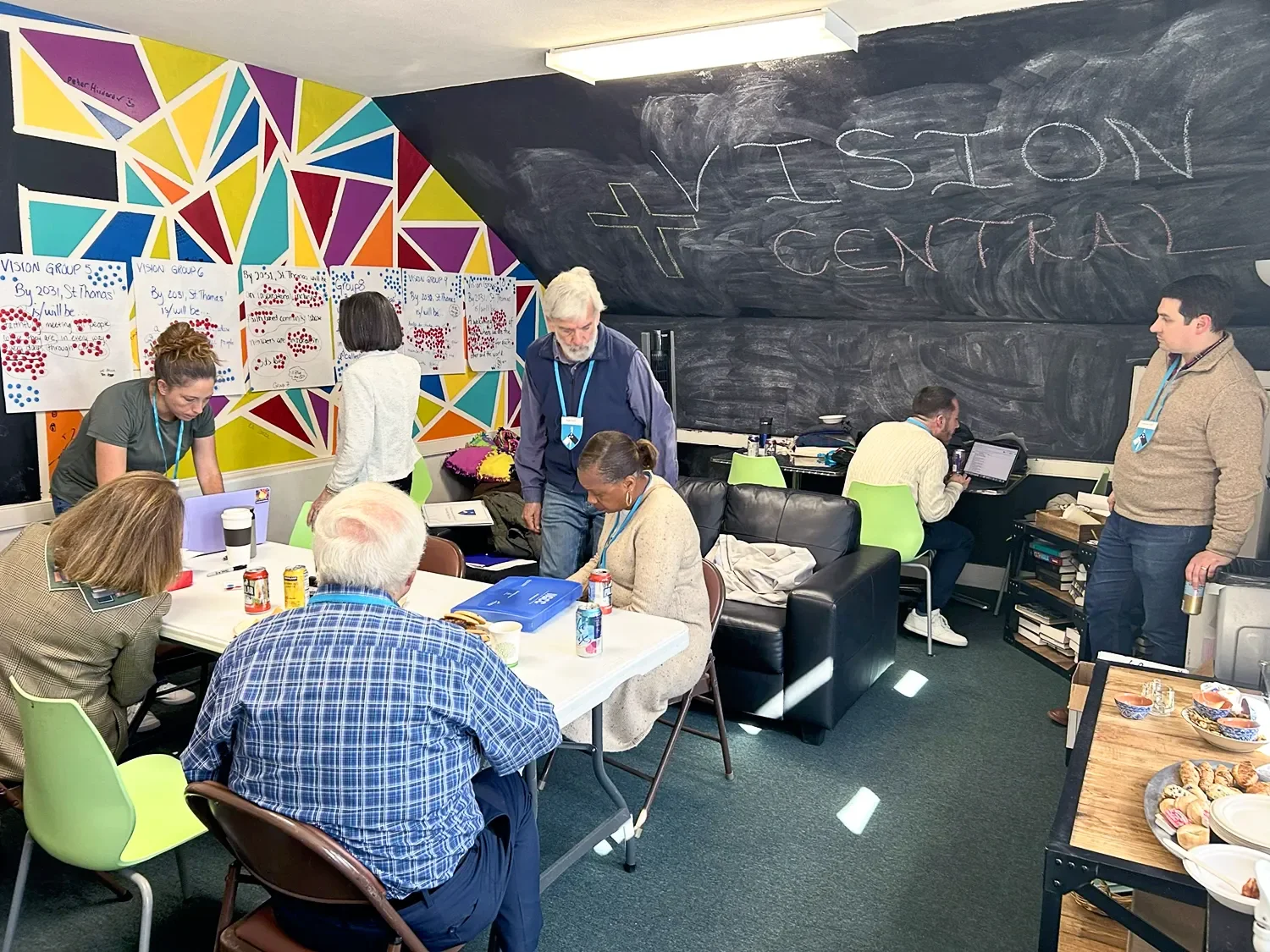 A small group of people working together in a workshop at St. Thomas’ Church Whitemarsh.