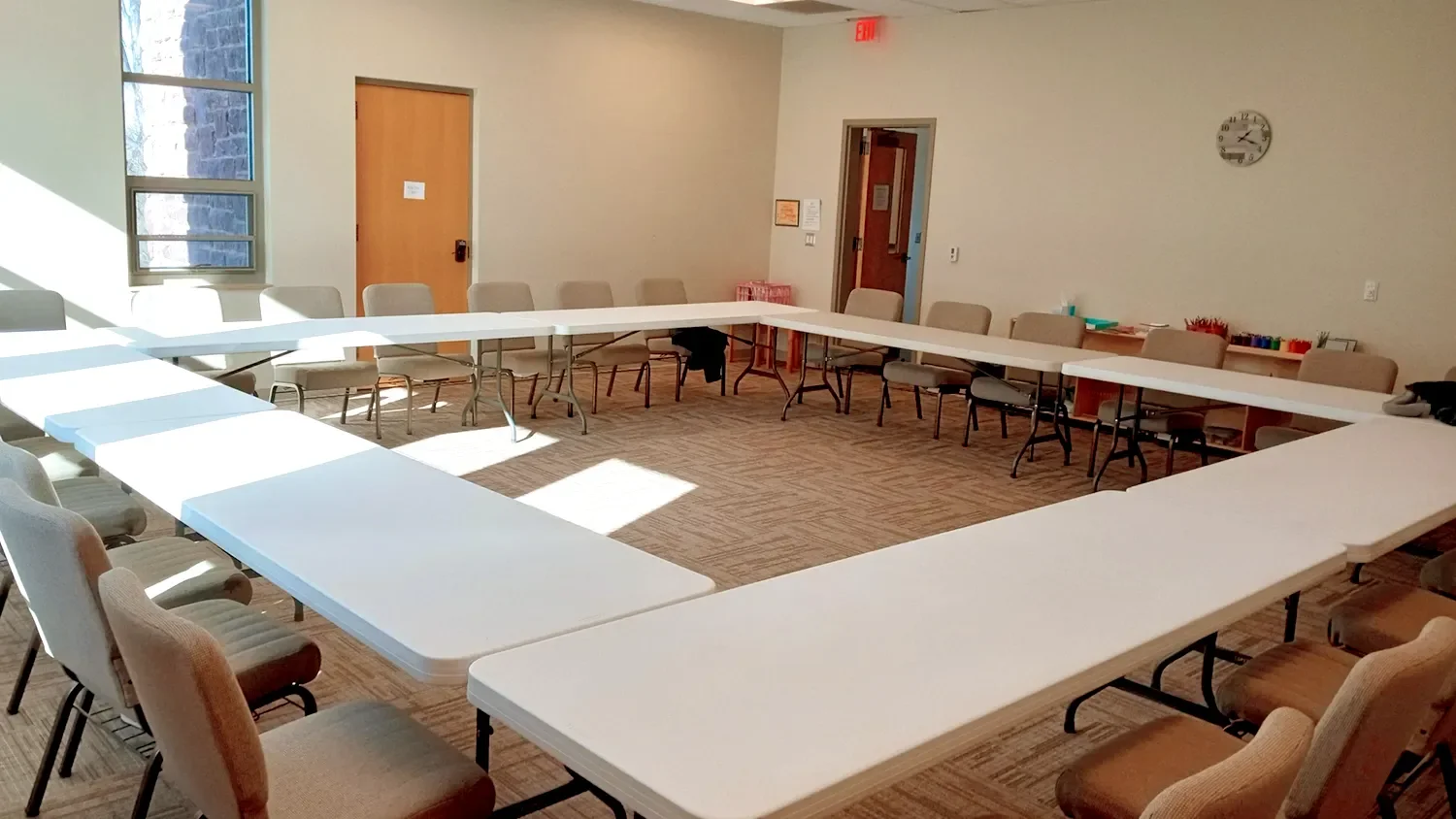 Empty room setup in the Beck Conference Room at The Retreat at St. Thomas’ Church Whitemarsh.