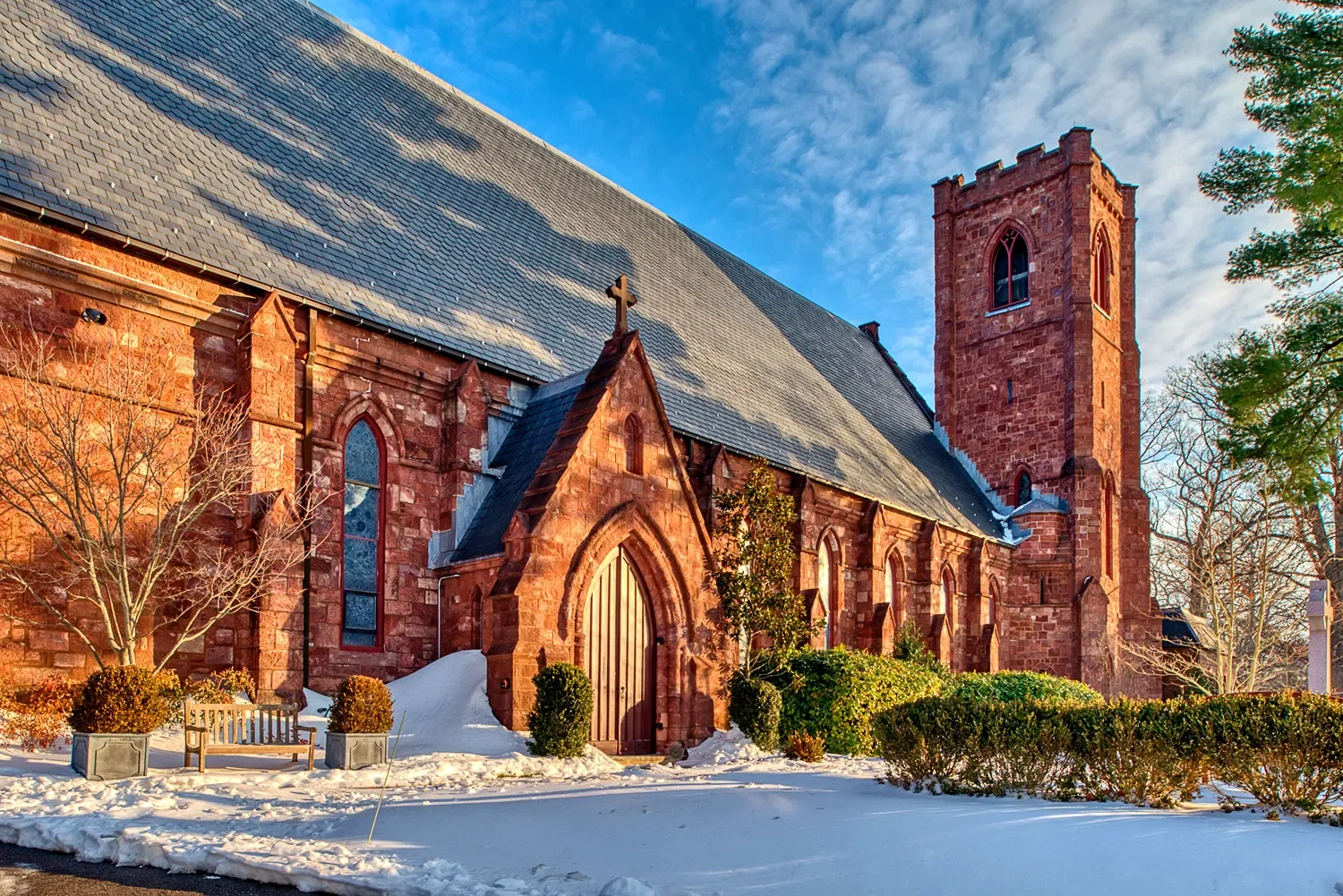 Main church exterior during winter at St. Thomas’ Church Whitemarsh.