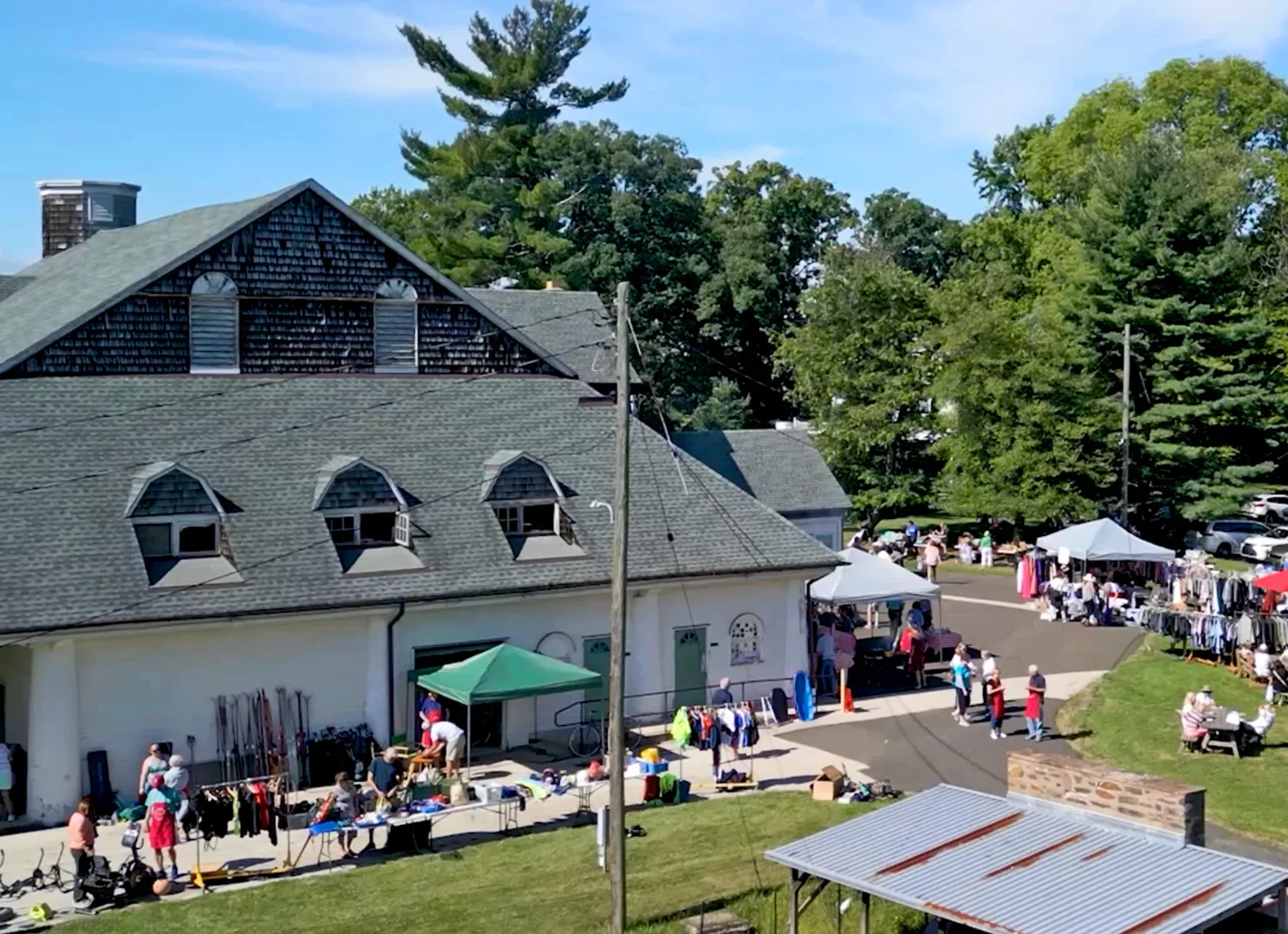 People shopping outside at The Barn at St. Thomas’ Church Whitemarsh.