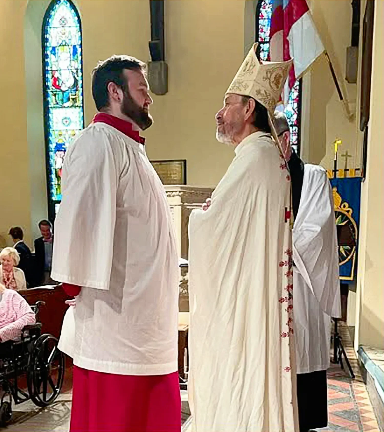 Bishop with a choir member during confirmation at St. Thomas’ Church Whitemarsh.
