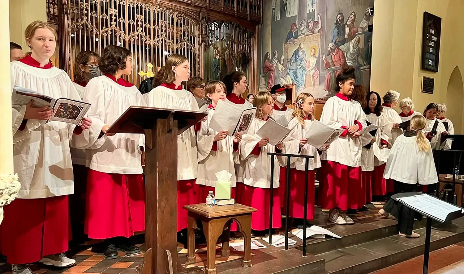 Choristers standing during service at St. Thomas’ Church Whitemarsh.