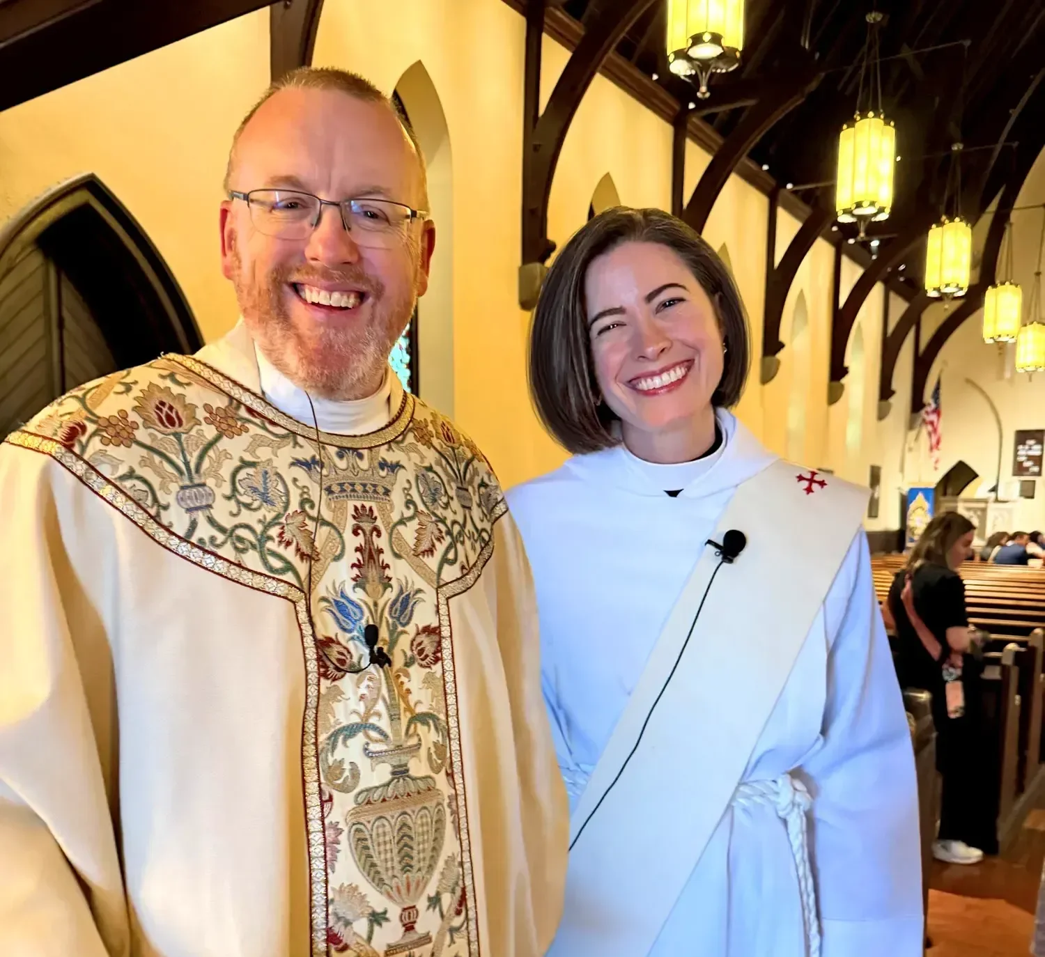 Father Dave and Mother Amy standing together and smiling after a service at St. Thomas’ Church Whitemarsh.