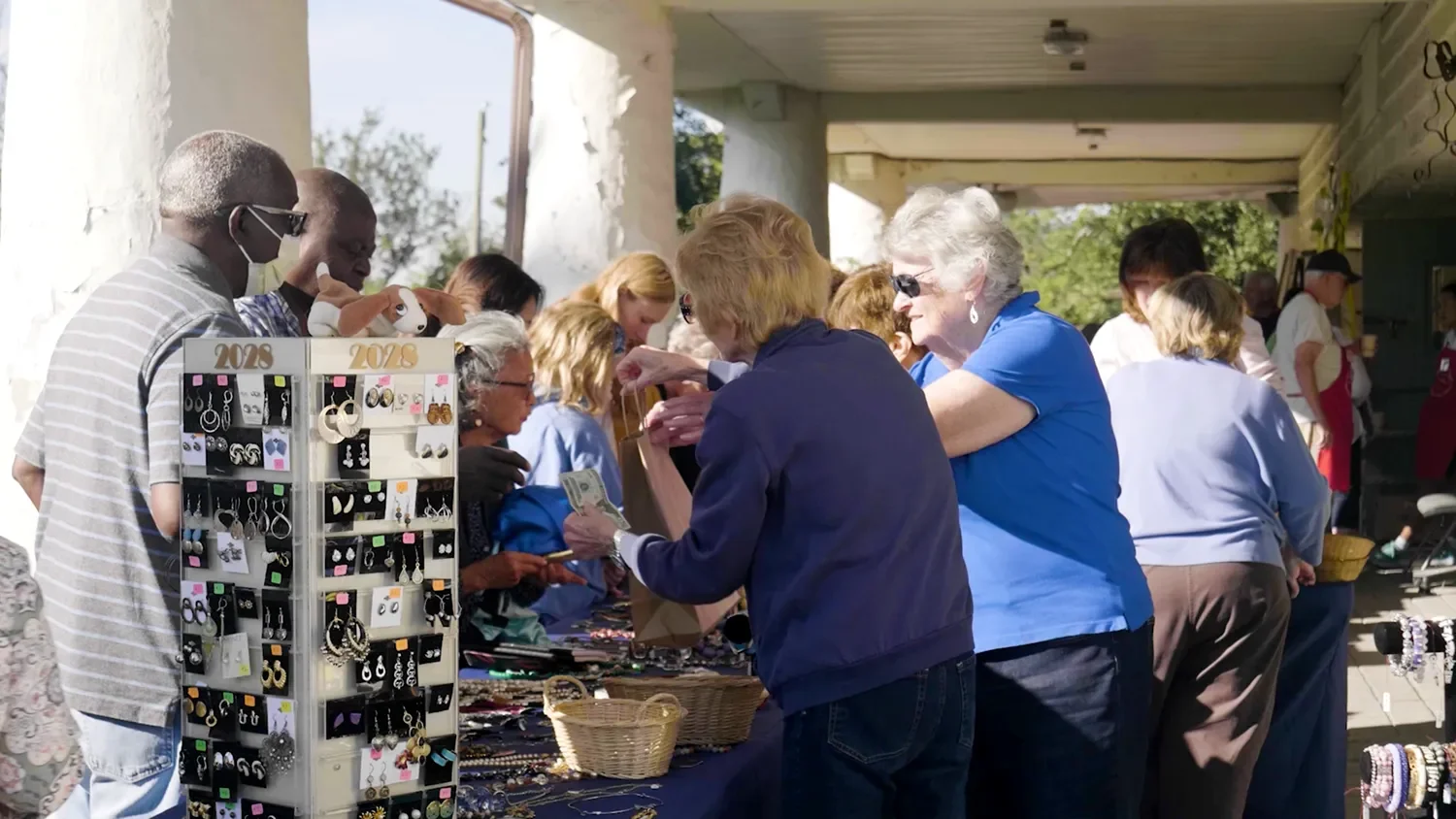 People shopping jewelry for sale at The Barn St. Thomas’ Church Whitemarsh.