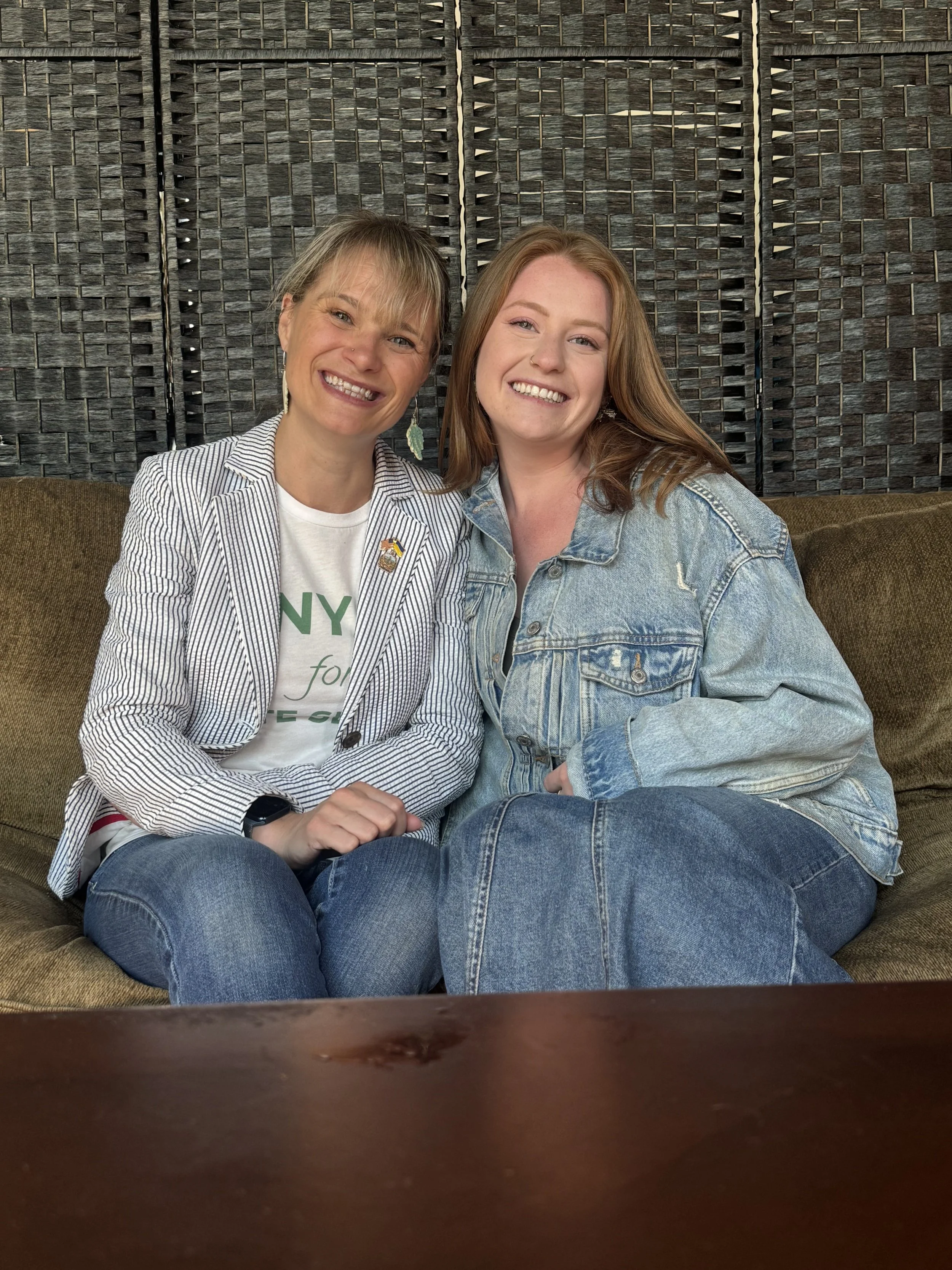A photo of Tanya and Grace sitting side by side