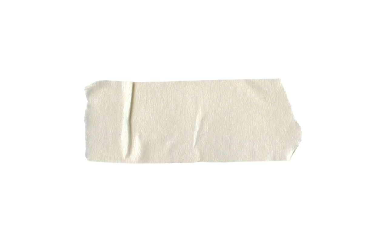 A torn piece of white tissue paper or napkin.