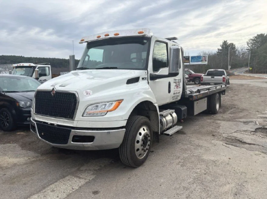 2023 International MV607 Roll Back Tow Truck