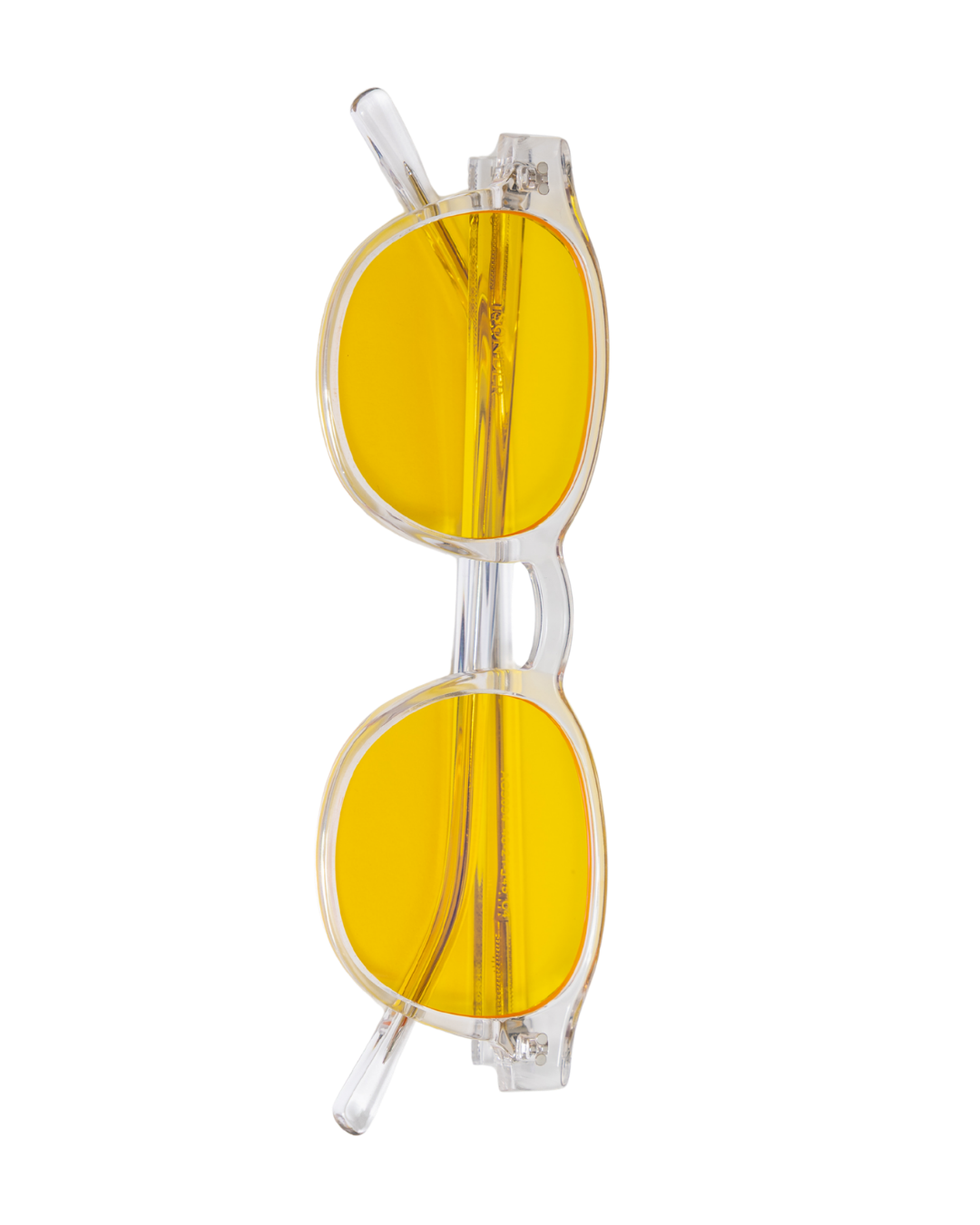 Pair of blue light blocking glasses with yellow tinted lenses and transparent frames.