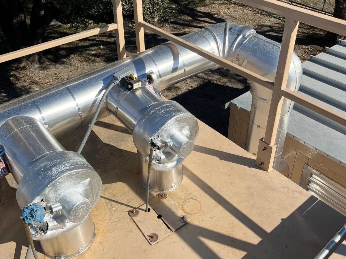Exterior mechanical piping insulation with aluminum metal jacketing installed by Vali Shield, LLC. Designed to protect insulated system from weather exposure, and improve durability.