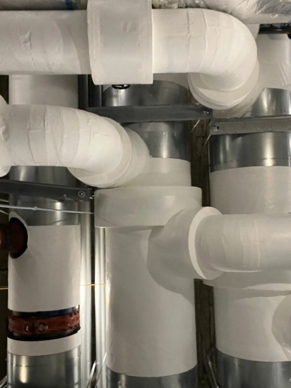 Chilled water pipe insulation installed by Vali Shield, LLC. Commercial and mechanical insulation system designed to prevent condensation reduce energy loss, and protect critical building infrastructure.