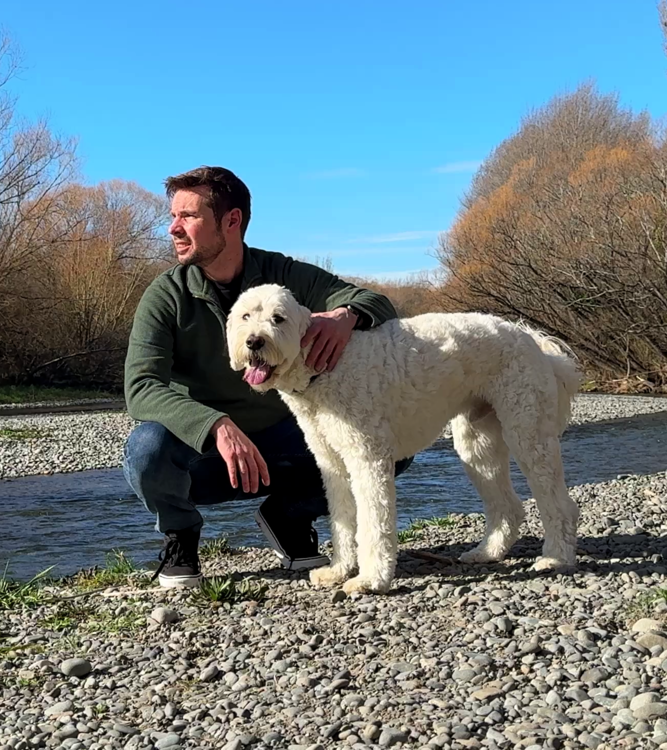 Nick Sail, founder of The Steady Human, outdoors with his dog Louie
