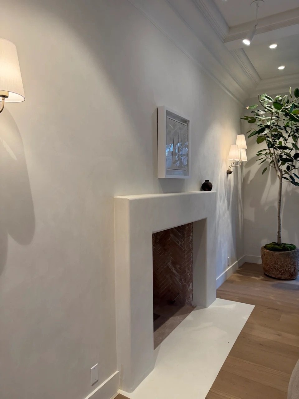 venetian-plaster-fireplace-brick-firebox.jpeg