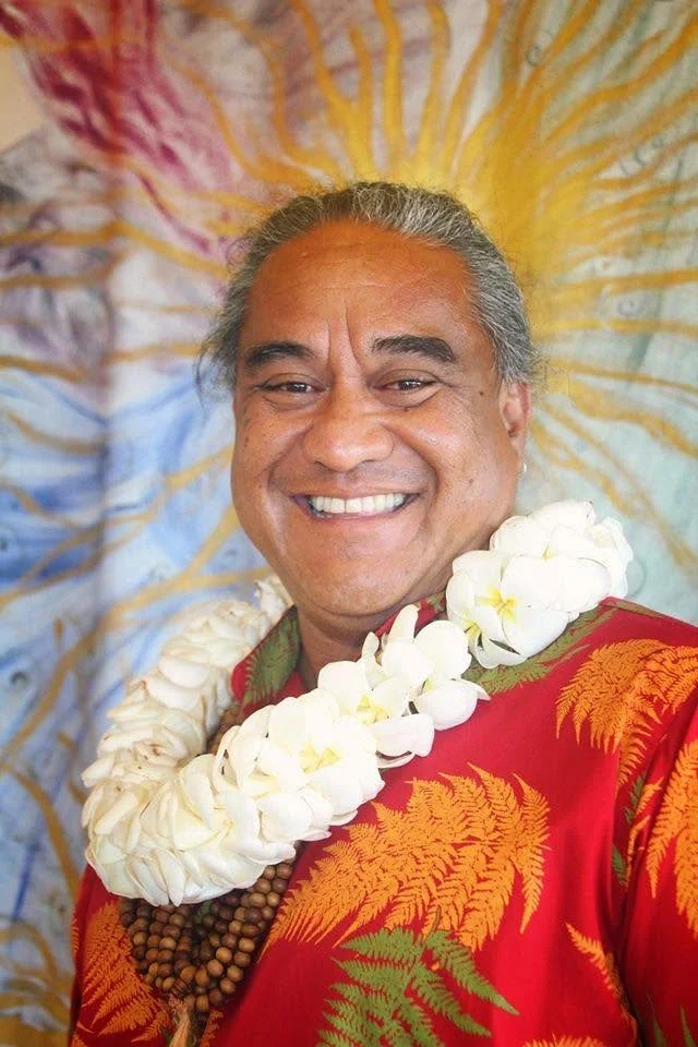 Speaker wearing flower lei at New Thought Center of Hawaiʻi Sunday Service