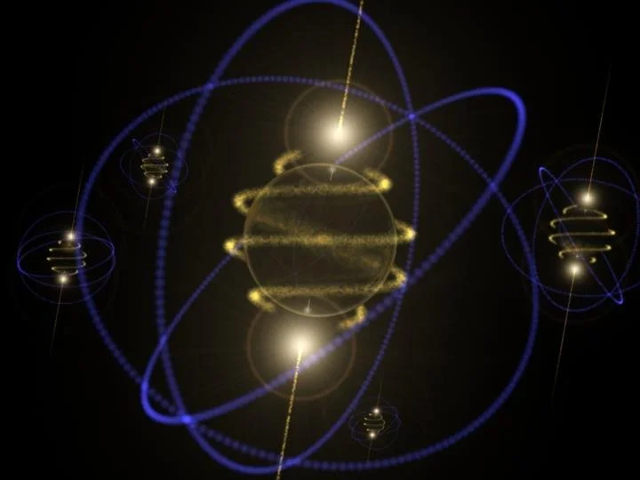 Futuristic digital rendering of atomic or quantum particles with glowing orbitals and energy trails in gold and blue colors.