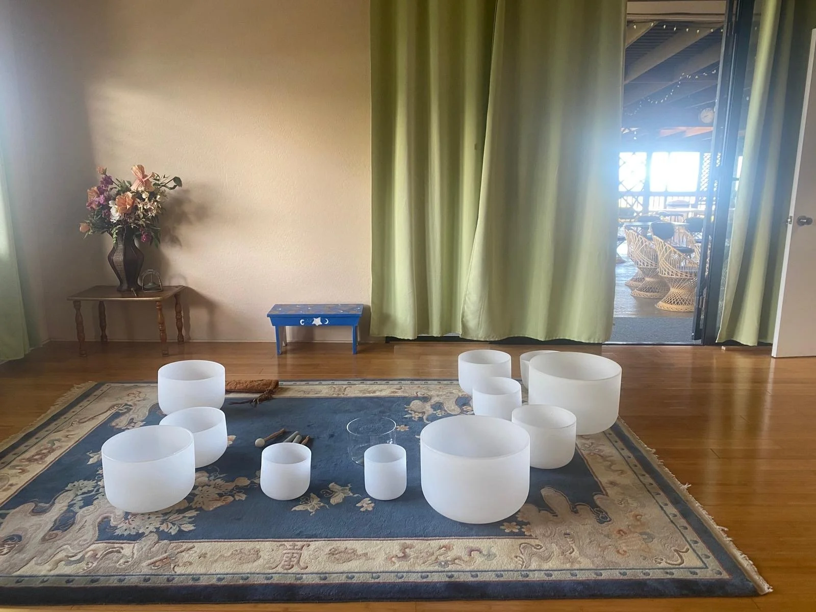White singing bowls and meditation tools at New Thought Center of Hawaiʻi