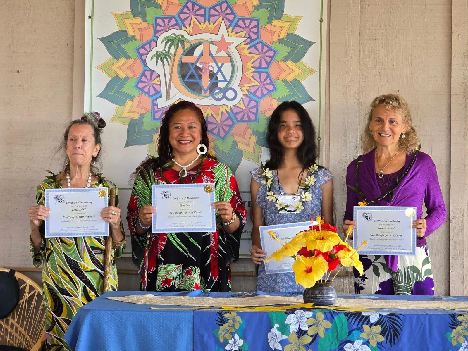 New members holding certificates of membership at New Thought Center of Hawaiʻi in Kealakekua
