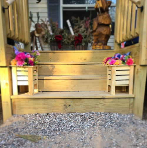 planters on steps with flowers web ready.png