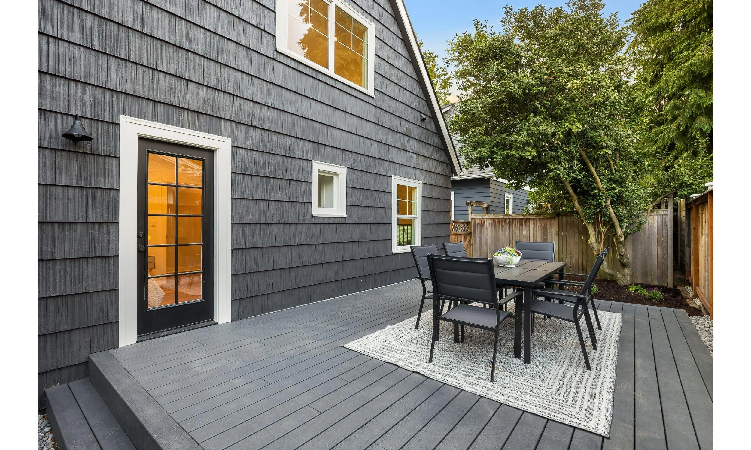 Back deck addition to a Tudor home